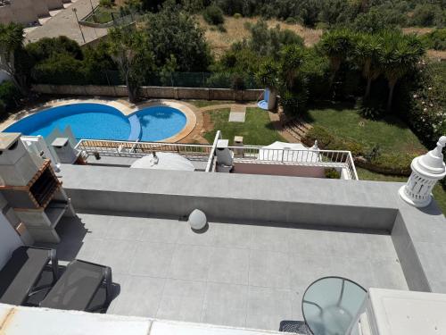 Seascape apartamento vista mar e piscina, terraço com BBQ