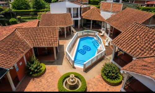 an overhead view of a swimming pool in a house at Hotel Aguablanca in La Mesa