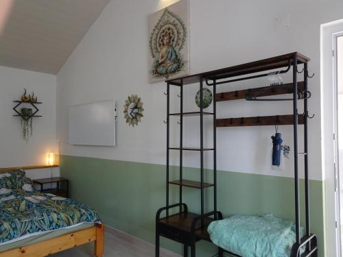 a bedroom with two bunk beds and a bed at Carma de Madeira Lodge in Penela