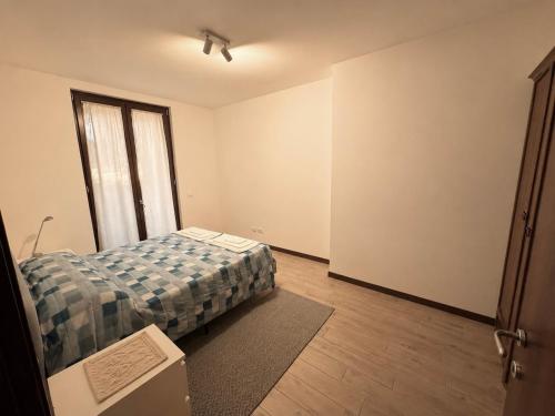 Vuode tai vuoteita majoituspaikassa Cornaro Apartment