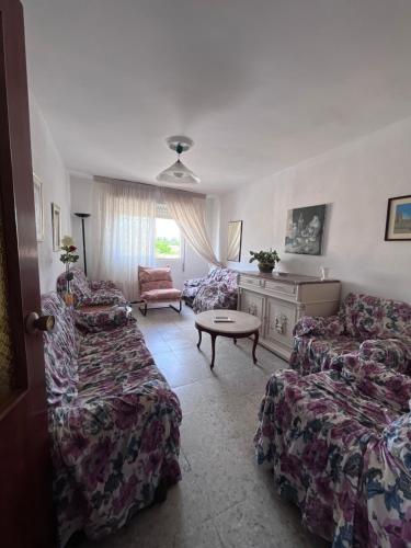 a living room with two couches and a table at Eclipse in Villasandino