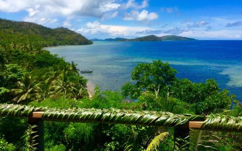 a view of a body of water with a beach at Oneta Resort in Ono Island