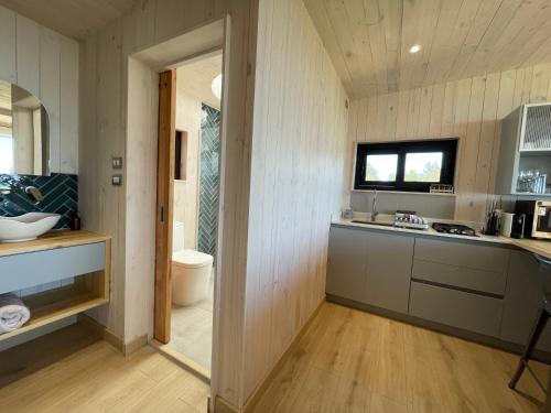 a kitchen with a sink and a counter top at Chackra Centinela in Matanzas
