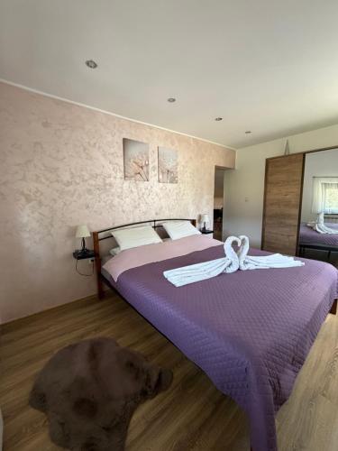 Llit o llits en una habitació de Apartman Patricia