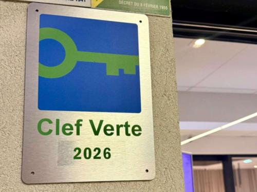 a sign for a clift verrite sign on a wall at Mercure Hotel & Spa Bastia Biguglia in Biguglia
