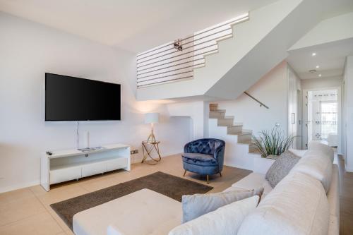 Alvor T2 com rooftop privativo e vista rio