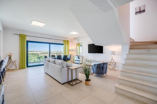 Alvor T2 com rooftop privativo e vista rio