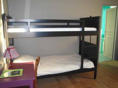 Postel nebo postele na pokoji v ubytování Le Relais des Capucines