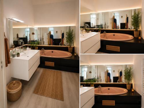 a bathroom with two sinks and a large mirror at Gare - Spacieux T2 avec Clim Balcon Wifi in Perpignan