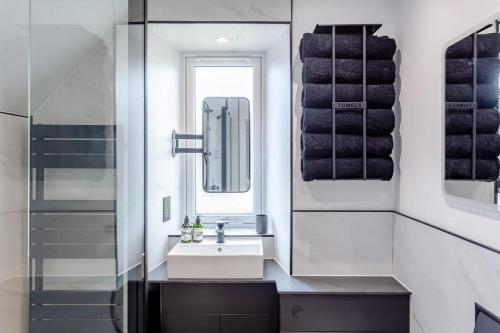 a bathroom with a sink and a mirror at 2 Bed in Thurso oc-n41742 in Thurso