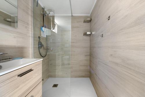 a bathroom with a shower and a sink at Villa Ondina 1 Carloforte in Carloforte