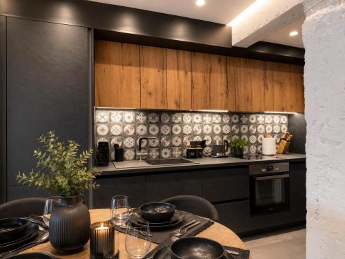 Gold & Concrete Acropolis Residence