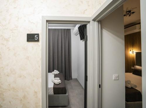a room with a door leading to a bedroom at Casa NOBIL in Alicante
