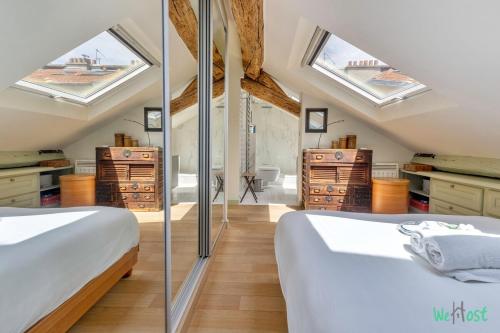 Duplex Marais - 2 Chambres, 5 Lignes Métro