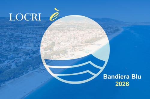 a picture of the logo of the bandera blue at Andrea's House in Locri