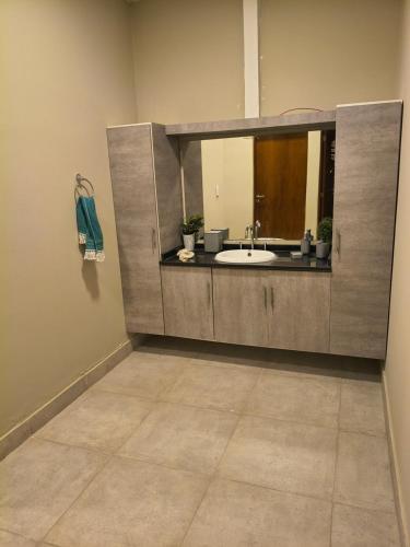 a bathroom with a sink and a mirror at Finca Las Marías in Cardozos