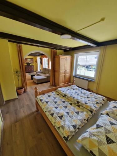 a bedroom with two beds in a room at Apartma Regrat in Lesce