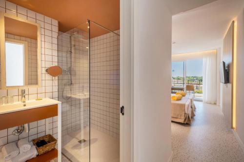 a bathroom with a shower and a sink at Cabot Cala Ferrera in Cala d´Or