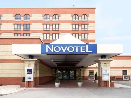 a nootel hotel with a sign in front of it at Novotel Southampton in Southampton