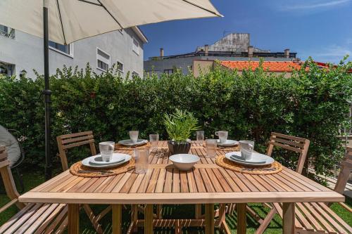 Apt with beautiful garden in the heart of the city