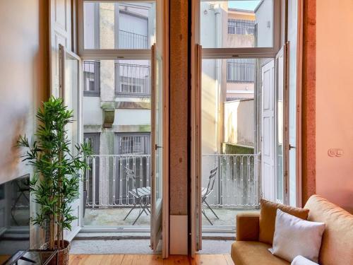 Loft with balcony on city's most important street