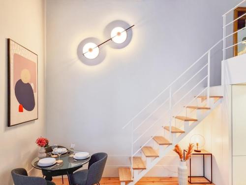 Loft with balcony on city's most important street