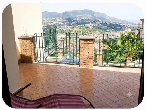a balcony with a view of a city at Casa Panorama in Monte di Procida