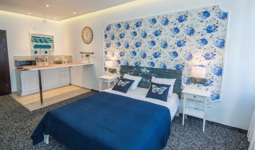 Ліжко або ліжка в номері Central Hotel
