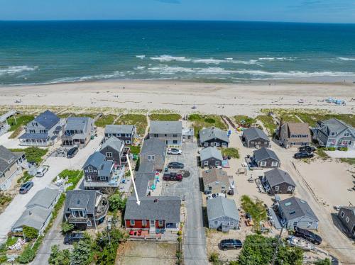 an aerial view of a house and the beach at East Sandwich Beachfront Retreat in East Sandwich