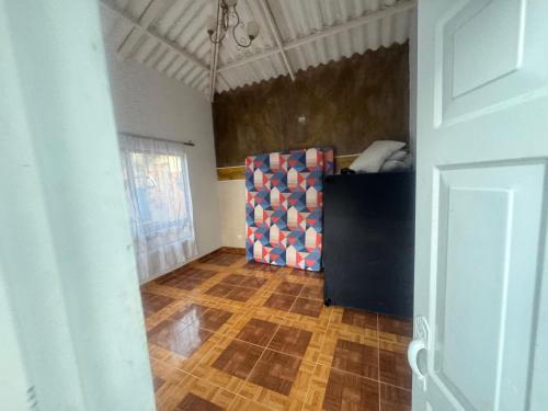 an empty room with a room with a door and a room with at Finca los carrangueros in Apulo
