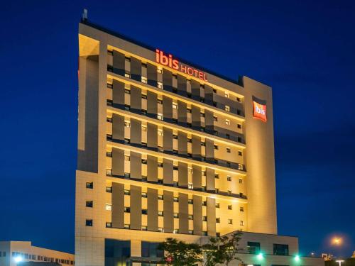 a hotel building with a hbos center sign on it at Ibis Istanbul Tuzla in Tuzla