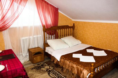  Кровать или кровати в номере Отель Бриз 