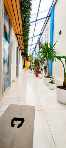 a hallway with a rug with the number on it at Concubinas del Inca in Cajamarca