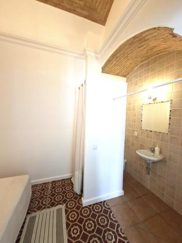 a bathroom with a shower and a sink at Olhão Barreta typical home ASM in Olhão