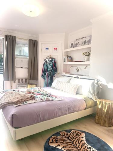 a bedroom with a large bed in a room at Catskill Apartment, Little Love Bird #5 in Shandaken
