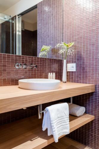 a bathroom with a sink and a mirror at Casa Burano in Burano