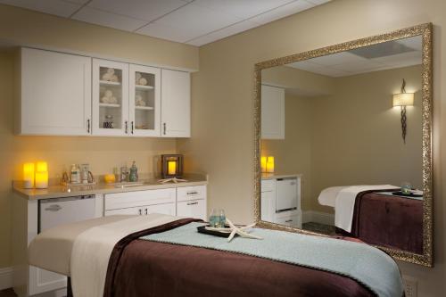 a hotel room with two beds and two lamps at Reefhouse Resort and Marina in Key Largo