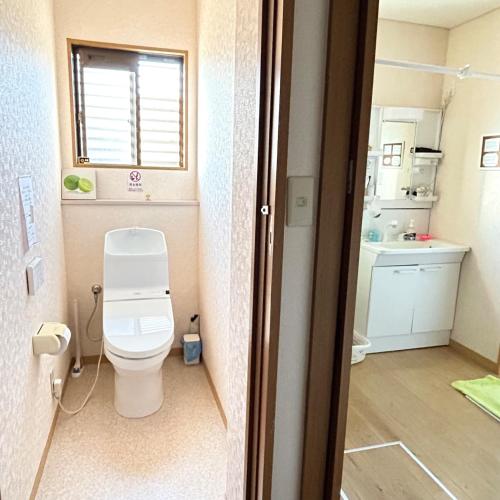 a small bathroom with a toilet and a sink at Makeit 1to3 - Vacation STAY 17356 in Chichibu