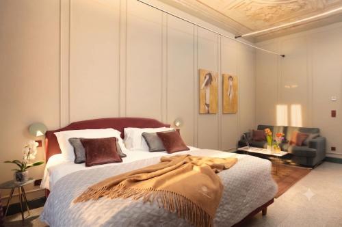 a bedroom with a large bed in a room at Homeby, Cinisca Suite Rose in Bologna