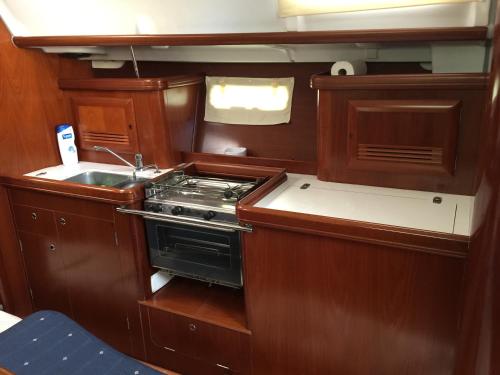 a kitchen with a stove and a sink at Puerto Calero Boat in Puerto Calero