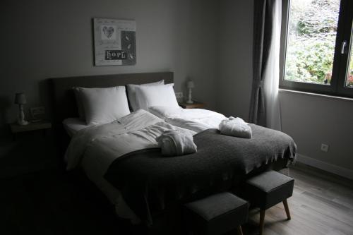 Postel nebo postele na pokoji v ubytování B&B Rosteline