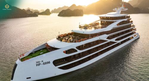 a large cruise ship on the water in the water at Diana Cruises Halong Bay - Luxury by Venus Group in Ha Long