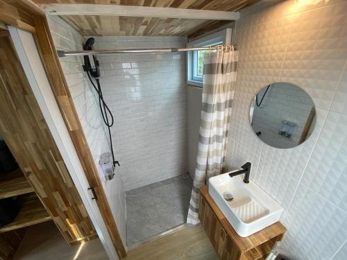 a bathroom with a sink and a mirror at Beach Access Tiny House 06 - Lipa Noi Beach in Koh Samui