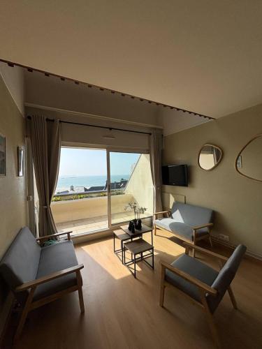 Duplex Saint Malo, front de mer, vue mer, plage, parking avec borne de recharge
