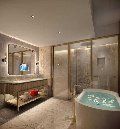 a bathroom with a tub and a television in it at InterContinental Jerusalem by IHG in Jerusalem