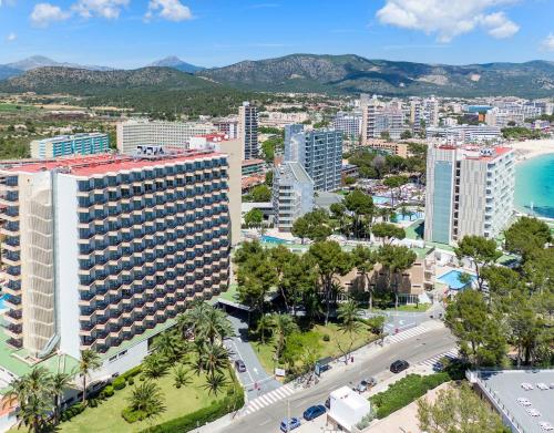 an aerial view of a city with tall buildings at SOL by Meliá Barbados in Magaluf