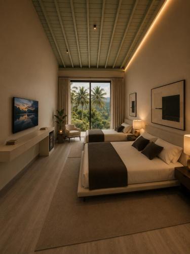 a large bedroom with two beds and a large window at Rivora Residence in Kandy