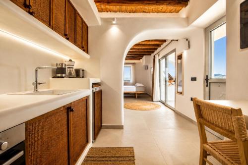 a kitchen with a sink and a counter top at iLocal Premium Services suite in Zefiría