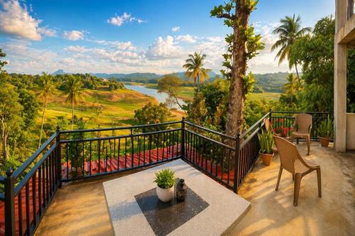 a balcony with a view of a river at The Don Dock Kandy in Kandy