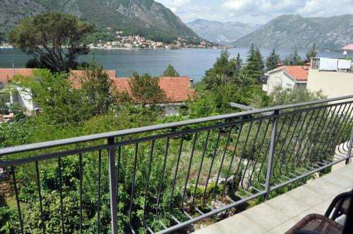 a balcony with a view of a body of water at Apartments Jovanovic - Alkima in Kotor